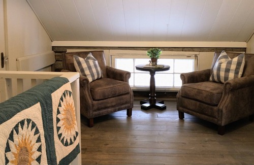 Robbinsville Cabin | Historic Log Cabin: Lake Front, Dock, Canoes, Private, Stylish