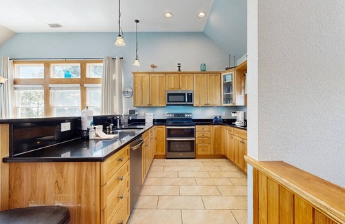 Wind Over Waves House | Incredible two-story home with private pool, hot tub, & game room