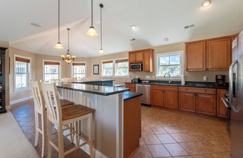 Sea Scape House | K0029 Show Boat scenic rental with pool, hot tub, and golf course views