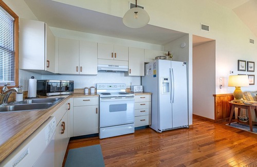 Colington Harbour House | K1557 Sounds Good. Waterfront perfect for your kayak & SUP, dogs welcome!