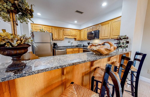 Lake Lure Condo | Lakefront condo with wood-burning fireplace, WiFi, two decks, & great views