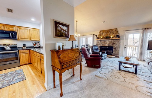 Lake Lure Condo | Lakefront condo with wood-burning fireplace, WiFi, two decks, & great views