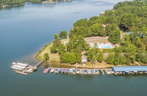 Steele Creek Cabin | Lakefront Property Two Bedroom Cabin #35 at Long Cove Resort by RedAwning