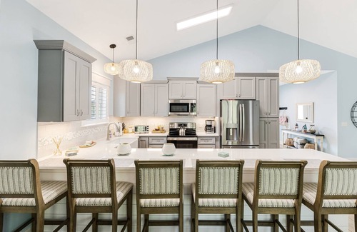Tranquil Harbour House | Luxurious 4-Bedroom Dog-Friendly Retreat in Oak Island w/6 Seater Golf Cart & 7 Person hot tub