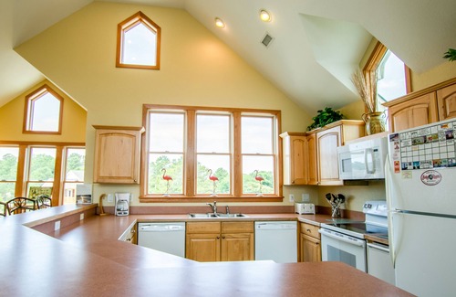 Duck House | Luxury 7 bedroom with private pool, volleyball court, WiFi, and keyless entry.