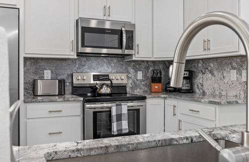 Ash House | Luxury Home Private Htd Pool w/WaterfallnBack Yard Oasis just Steps to Beach!