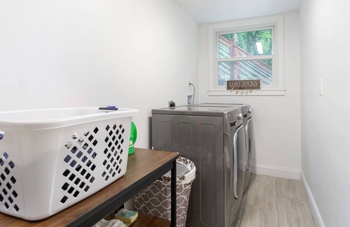 Laurel Park House | Mid century complete remodel located in the highly desirable Laurel Park area