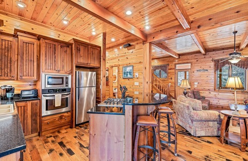 Tuckasegee House | Mountain cabin with wrap-around balcony, games, fireplace, & children's items
