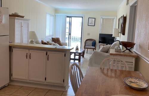 Morehead City Condo | Ocean-side condominium with pool. Fully-equipped for relaxed vacationing.