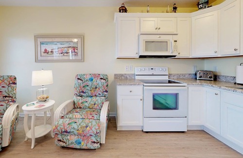 Surf City Condo | Oceanview condo located within walking distance to the beach!
