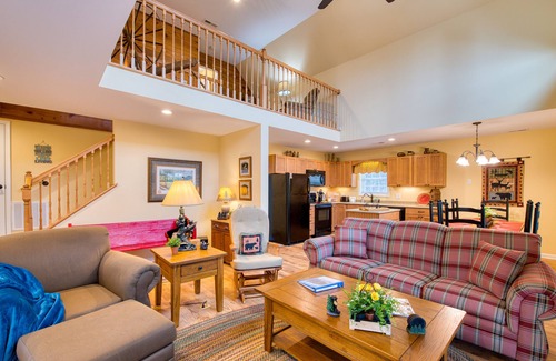 Lake Junaluska House | Open and modern upper-level space with WiFi, central AC, pool, wraparound deck