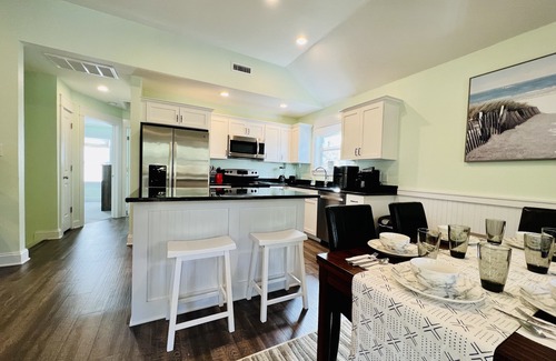 Colington House | Poseidon's Getaway - Beach House: OUTDOOR HOT TUB, 2 King Beds, and 1 Queen Bed