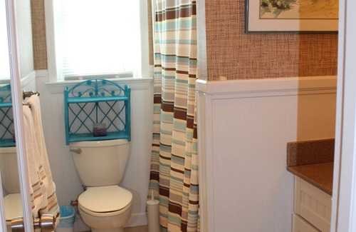 Nags Head Cottage | Rest easy steps away from the beach!