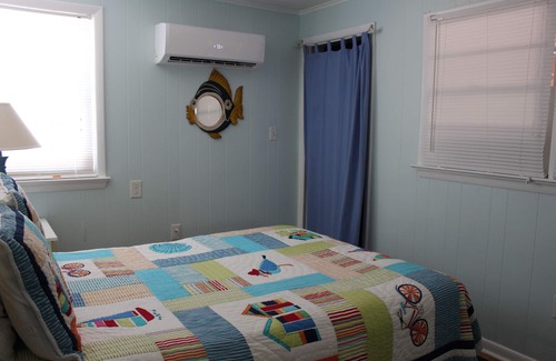 Nags Head Cottage | Rest easy steps away from the beach!