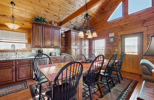 Whittier Cabin | Secluded mountain view log cabin with WiFi, fireplace, & wrap-around porch