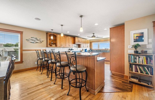 Colington House | Sunset Bay 5 Bedroom Home with a Jacuzzi Tub, Work-Out Room and Bayside Access!
