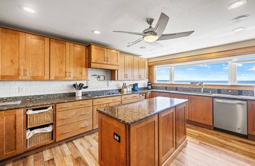 Colington House | Sunset Bay 5 Bedroom Home with a Jacuzzi Tub, Work-Out Room and Bayside Access!