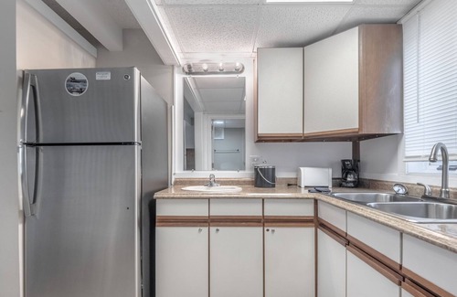 Airlie Condo | The Waterway 227: King + FSS Studio with complex pool