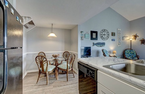 Surf City Condo | Top Floor Condo with Loft - Pool and Ocean Views!