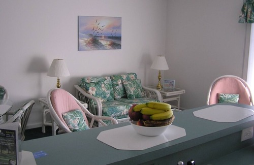 Sea Trail Condo | Top floor with balcony, across from pool & activity center, 4 minutes to beach