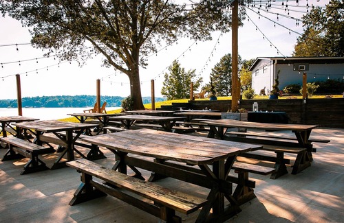 Steele Creek Cabin | Waterfront, 100- Year-Old wood Cabin #16 at Long Cove Resort by RedAwning