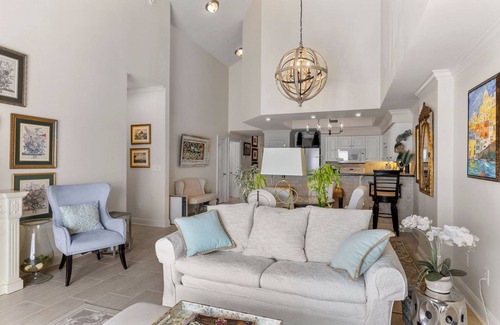 Indian Beach Condo | Waterfront condo with balcony, grill, washer/dryer, AC, pool, game room, & gym