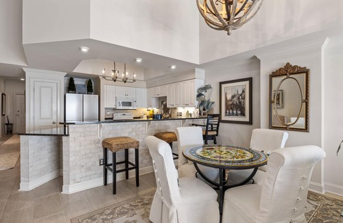 Indian Beach Condo | Waterfront condo with balcony, grill, washer/dryer, AC, pool, game room, & gym