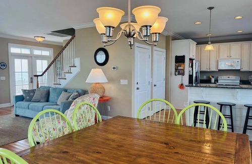 Holden Beach House | 1 Fine Day, a 4BR oceanfront retreat in Holden Beach, sleeps 10 with stunning views.