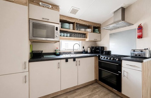 Hopton House | 10 berth caravan with side decking at Broadland Sands ref 20223BS