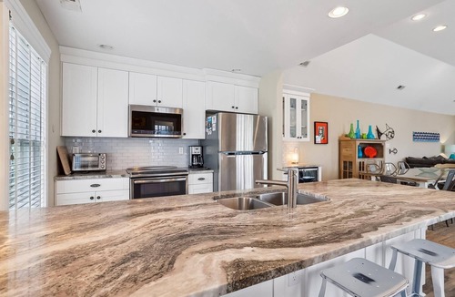 Buck Island Apartment | 1606 - Shades of Sand, a spacious 4-bed 4.5-bath Corolla, NC, hot tub, perfect for up to 9 guests.