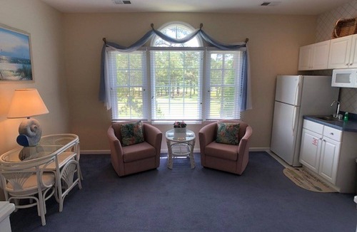 Sea Trail Condo | 2 BDRM Sunset Beach Condo: Screened Patio with view of Jones/Byrd 10th hole.