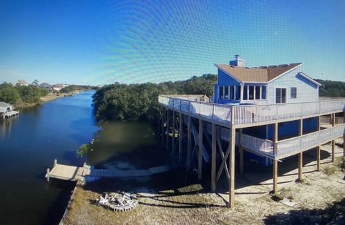 Carova Beach House | 2 Free beach parking passes! Waterfront Hot Tub Boat dock Pet friendly 360 Decks