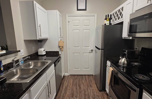 Huntersville Apartment | 2BR Sanctuary - Gated Community, Pool, Gym, Pet-Friendly Near Birkdale Village.