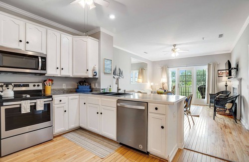 Folly Beach Condo | 2nd-floor retreat with screened porch, shared pool, WiFi, central AC & elevator