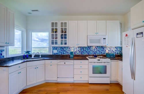 Village of Stump Sound House | 2nd-row ocean-view home with elevator, cmty pool & tennis