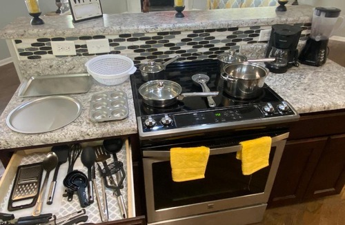Terry Sanford House | 4-bedroom brick home with a full kitchen, king size bed and all the space you need for you and your large family on your getaway.