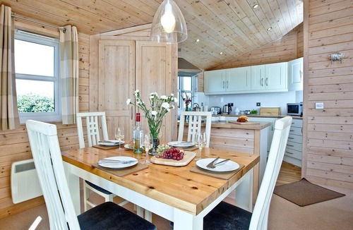 St Merryn Cabin | A light and spacious lodge with one double with walk in wardrobe and en-suite shower and one twin.