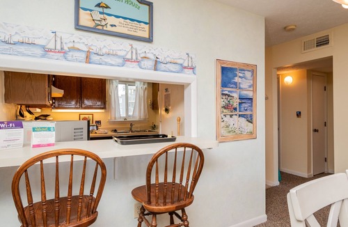 Caswell Beach Condo | A Pelican's Paradise: Condo with Community Pool and Ocean Views