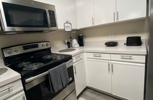 Terry Sanford Condo | A Touch of Sunshine Ideal For Long Term Stays