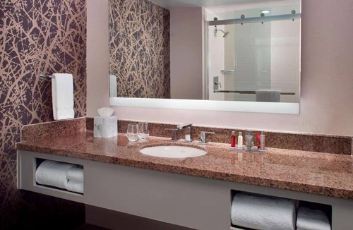 Downtown Hotel | Across Raleigh Convention Center + Dining & Pool