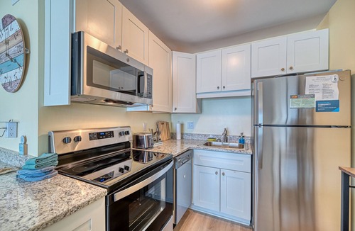 Sneads Ferry Condo | Arrr Place. Beachfront, 1 BR, pool & beach access. 2 Queens, 2 bunks