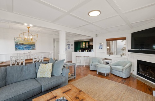 Bald Head Island Condo | As you enter, the Bald Head Creek and marsh vistas-through the walls of windows-catch your eye.