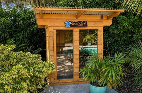 Boyette Springs House | Backyard oasis w/pool, sauna & fire pit