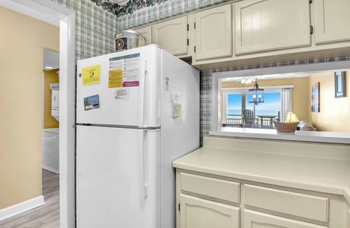 Caswell Beach Condo | Balcony At The Beach: Oceanfront Condo with Community Pool