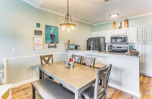 Carolina Yacht Landing Condo | Balcony + Pool Access: Serene Little River Retreat