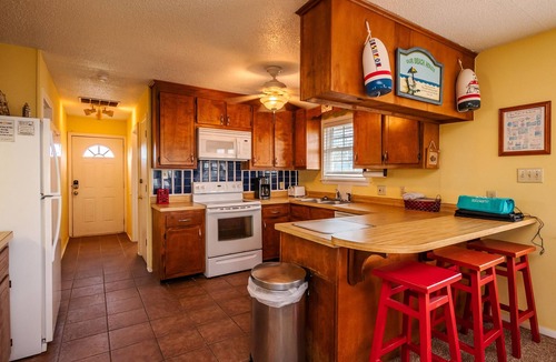 Yaupon Beach House | Beach Barn: Dog-friendly, Oceanfront Home with Sun Deck