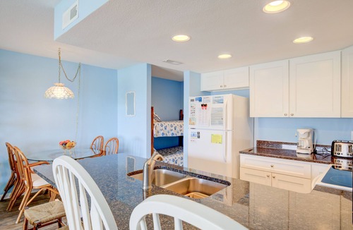 Surf City Condo | Beach condo with pool, sundecks, outdoor showers & direct beach access