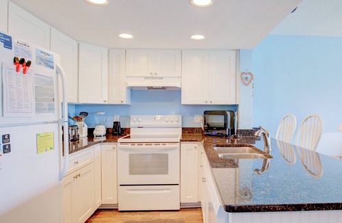 Surf City Condo | Beach condo with pool, sundecks, outdoor showers & direct beach access