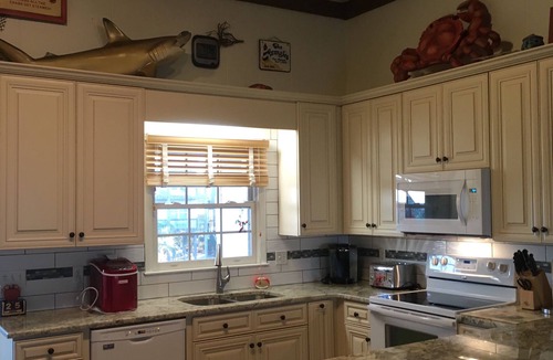 Supply House | Beach Front Family Home with a NEW Beach! Incredible Screened In Porch!