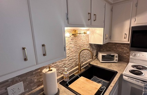 Gulf Stream Estates Condo | Beach Haven Ground Floor Walk to Beach Pool + Fishing Dock Gated